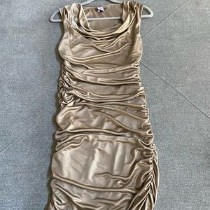 Light gold ribbed dress. Can be worn short or just below the knees